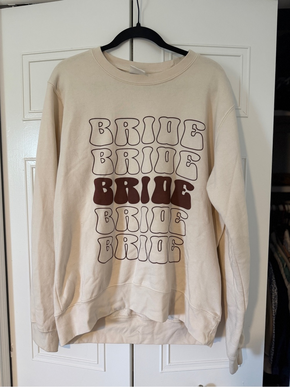 Pacifica Cream Sweatshirt with Brown Graphic